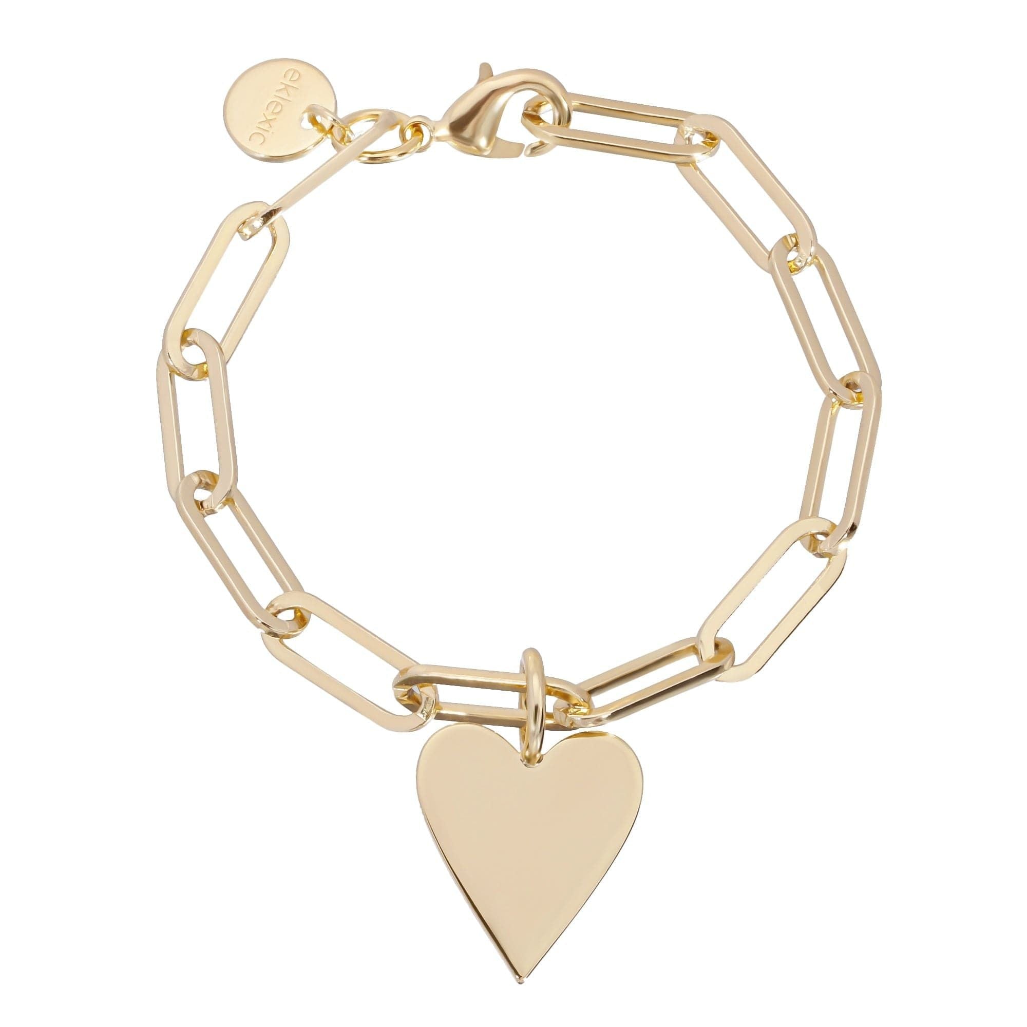 A gold-colored bracelet with a large heart charm attached to a chain.