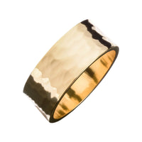 A 9.5mm wide recycled brass ring with a hammered texture, showing a smooth and polished finish.