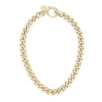 A gold-plated brass curb chain necklace with a distinctive horseshoe clasp.