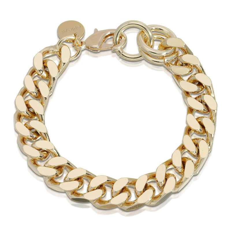 A gold-colored recycled brass cuban link chain bracelet with a lobster clasp closure.