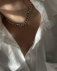 Woman showing a close up of Taraji Necklace