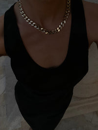 Lady in a black dress wearing Taraji Necklace