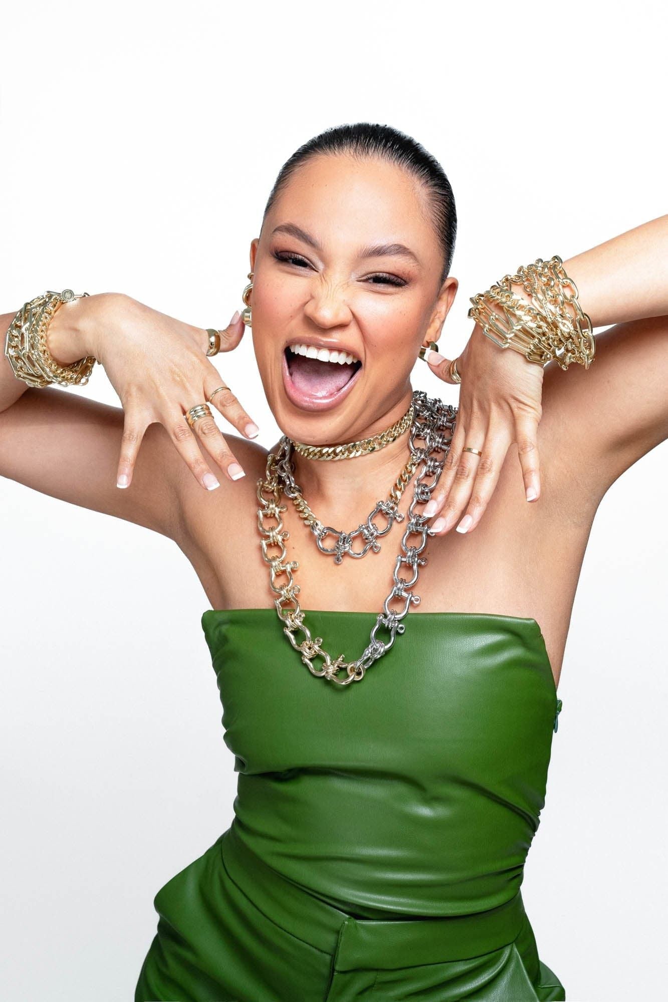 Lady showing all her jewelry including Two Toned Hendrick Necklace