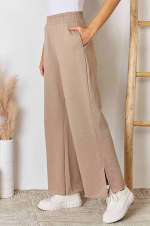Right pocket view of RISEN Wide Waistband Slit Wide Leg Pants