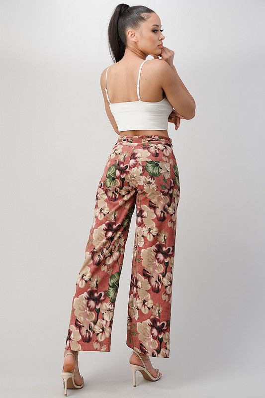 Model showing the back of LIGHT WEIGHT CORDUROY FLORAL WIDE LEG PANTS