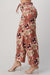 Side view of LIGHT WEIGHT CORDUROY FLORAL WIDE LEG PANTS