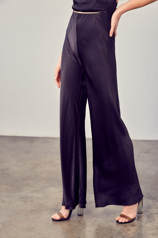 View of the side of SATIN FLARED PANTS