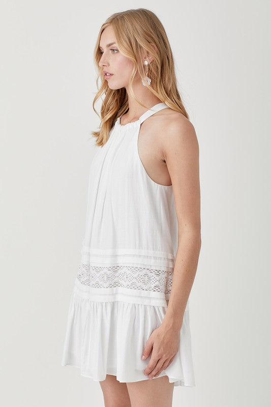 Left side view of HALTER NECK TRIM LACE WITH FOLDED DETAIL DRESS-white