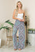 Model showing full view of Smocked Wide Leg Pants-blue combo