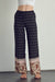 full front view of Elastic waist palazzo pants in ethnic print-black