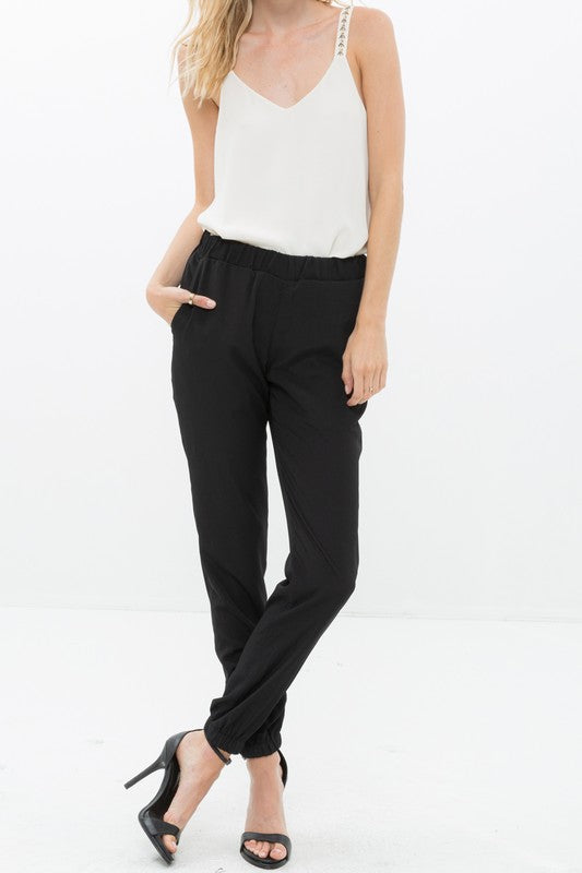 Front of Ro &amp; De Ankle Cuffed Black Crepe Pants In Black
