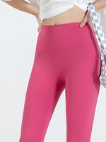 Woman showing waist of pink Wide Waistband Sports Leggings 
