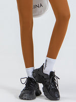 Close up ankle area of brown Wide Waistband Sports Leggings 