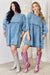 View of  two women wearing Full Size Oversized Denim Babydoll Dress one the left is a plus size dress