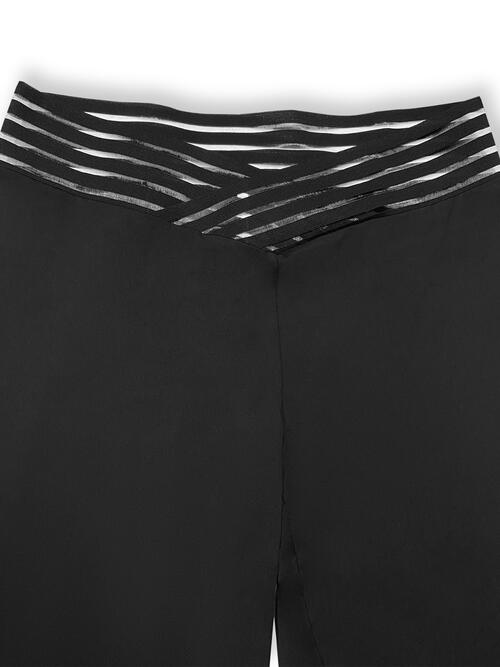 Close up view of the waist of Plus Size V-Waistband Bootcut Pants