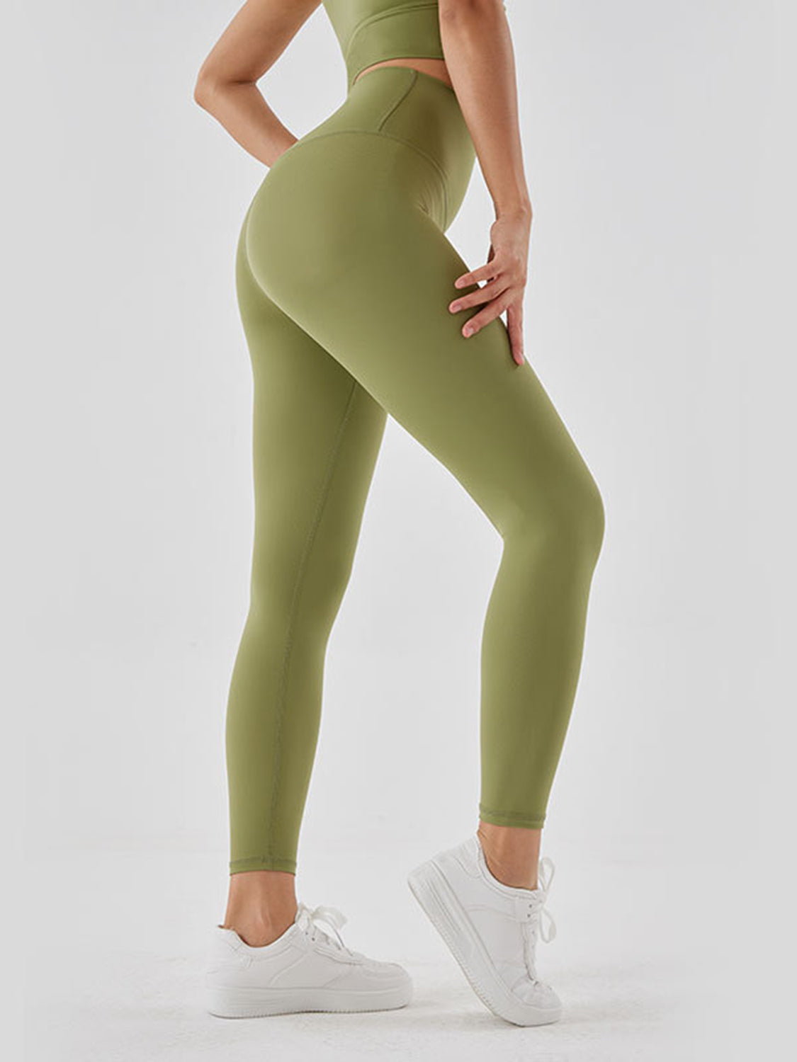 Woman showing green Wide Waistband Sports Leggings
