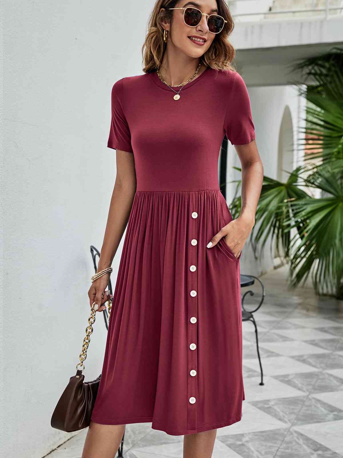 Model showing pocket Button Detail Tee Dress with Pockets-wine