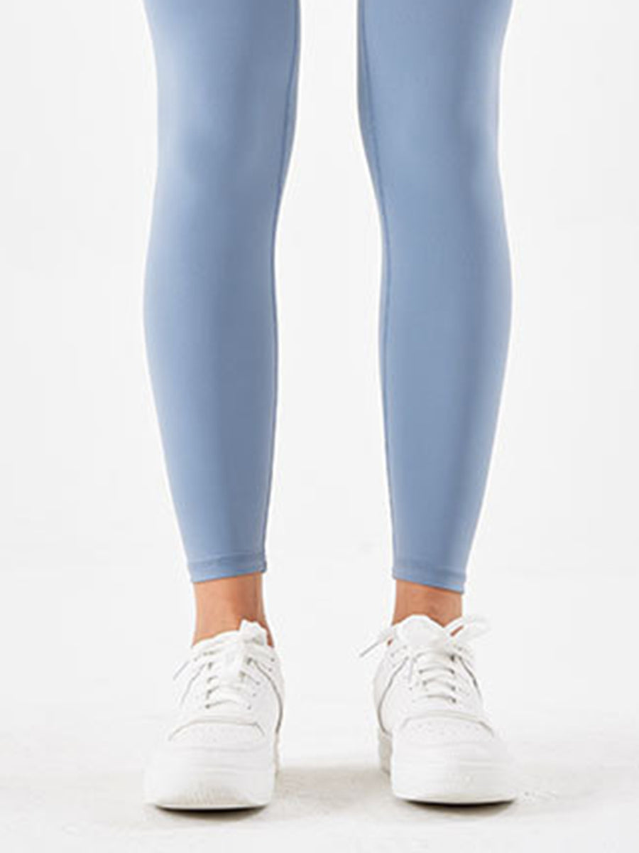 Close up of ankle area of blue Wide Waistband Sports Leggings 