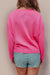 View of the back of XOXO Heart Round Neck Dropped Shoulder Sweater pink