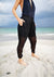 Model on the beach showing pockets on PANTS LOOSE ELASTIC WAIST