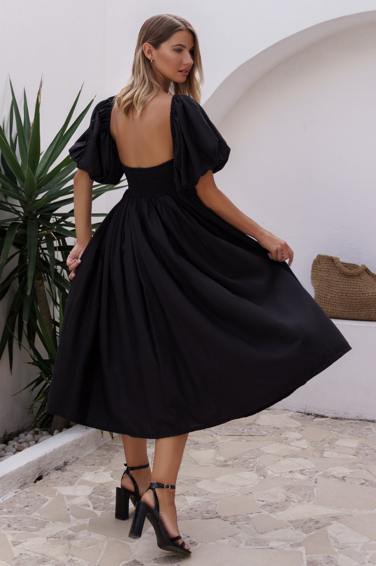 full back view of Cherie Puff Sleeve Midi dress-black