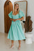 Back of Cherie Puff Sleeve Midi dress- tosca