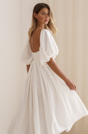Left side view of Cherie Puff Sleeve Midi dress- white