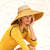Nude and yellow straw hat
