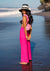 Model on the beach showing a side view of TAYLOR Wide-leg Pants in Hot Pink