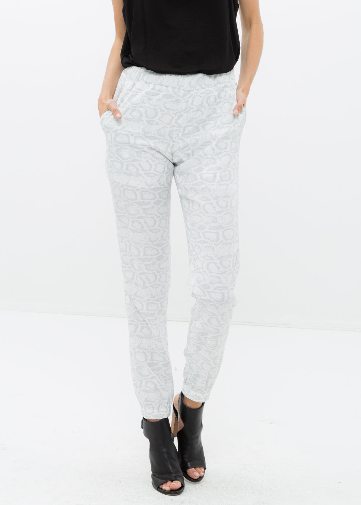 Front view of Women&#39;s High Waist Printed Pants In Ivory Silver