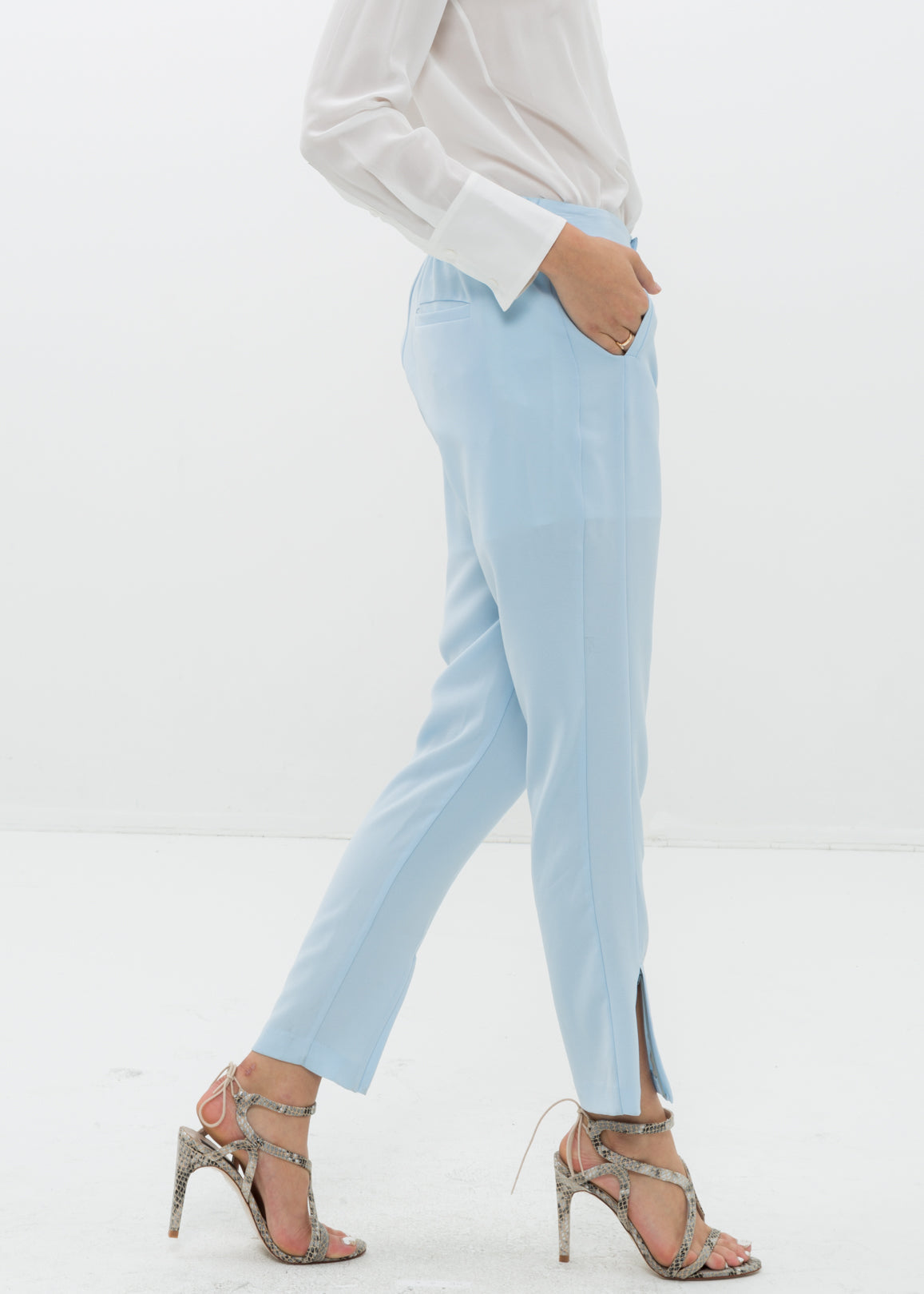 Model showing pocket of Women&#39;s Front Slit Trouser In Sky Blue