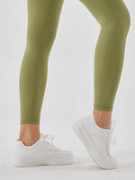 Close up ankle of  green Wide Waistband Sports Leggings 