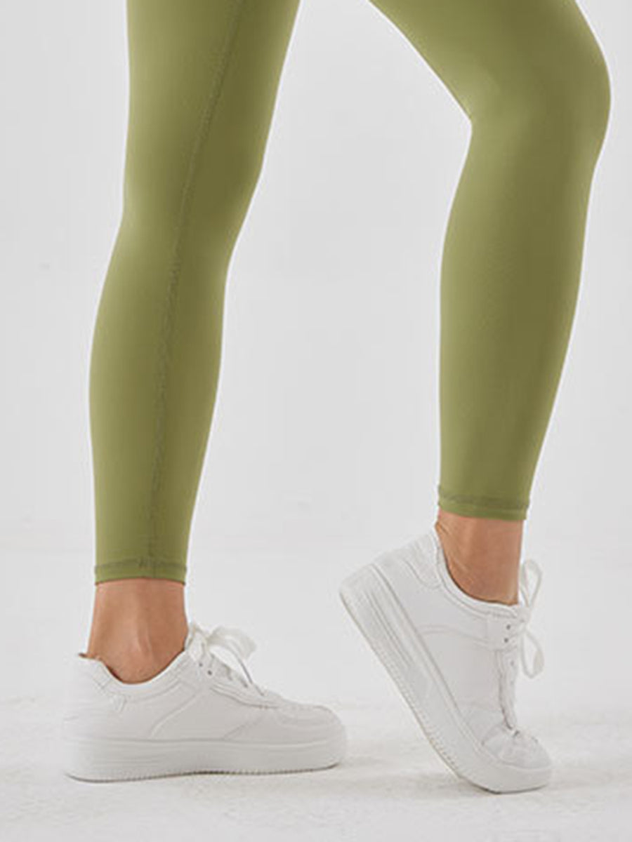 Close up ankle of  green Wide Waistband Sports Leggings 