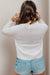 Back view of XOXO Heart Round Neck Dropped Shoulder Sweater white