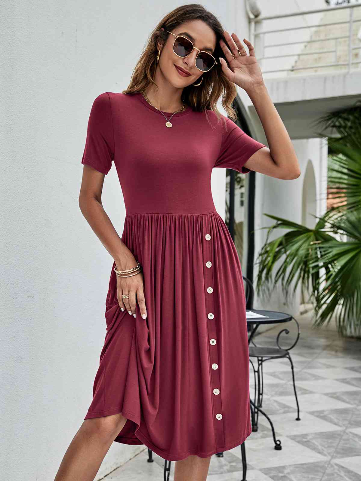 Model showing the full view of Button Detail Tee Dress with Pockets-wine