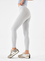 Side view of white Wide Waistband Sports Leggings 