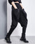 Model showing front pockets on Tanaka Pocket High Waist Harem Pants - Black
